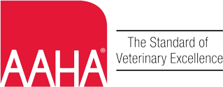 The image features the logo of the American Animal Hospital Association (AAHA). The logo includes a red block with the letters "AAHA" in white, followed by the text "The Standard of Veterinary Excellence" in black to the right, emphasizing its commitment to veterinarians and their practices.